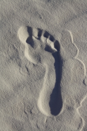 Lidé - stopa v písku