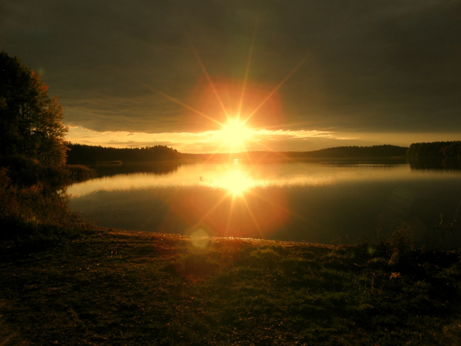 Západ Slunce nad rybníkem