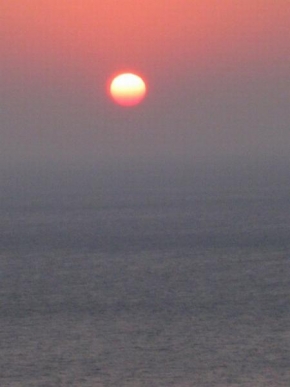 Po setmění - Západ slunce nad mořem